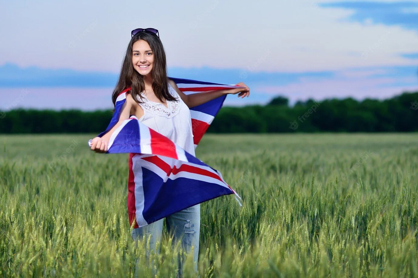 young-smiling-girl-field-wheat-flag-great-britain-concept-learning-english_136550-150.webp