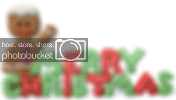 gingerbread_man_waving_behind_si-1.gif